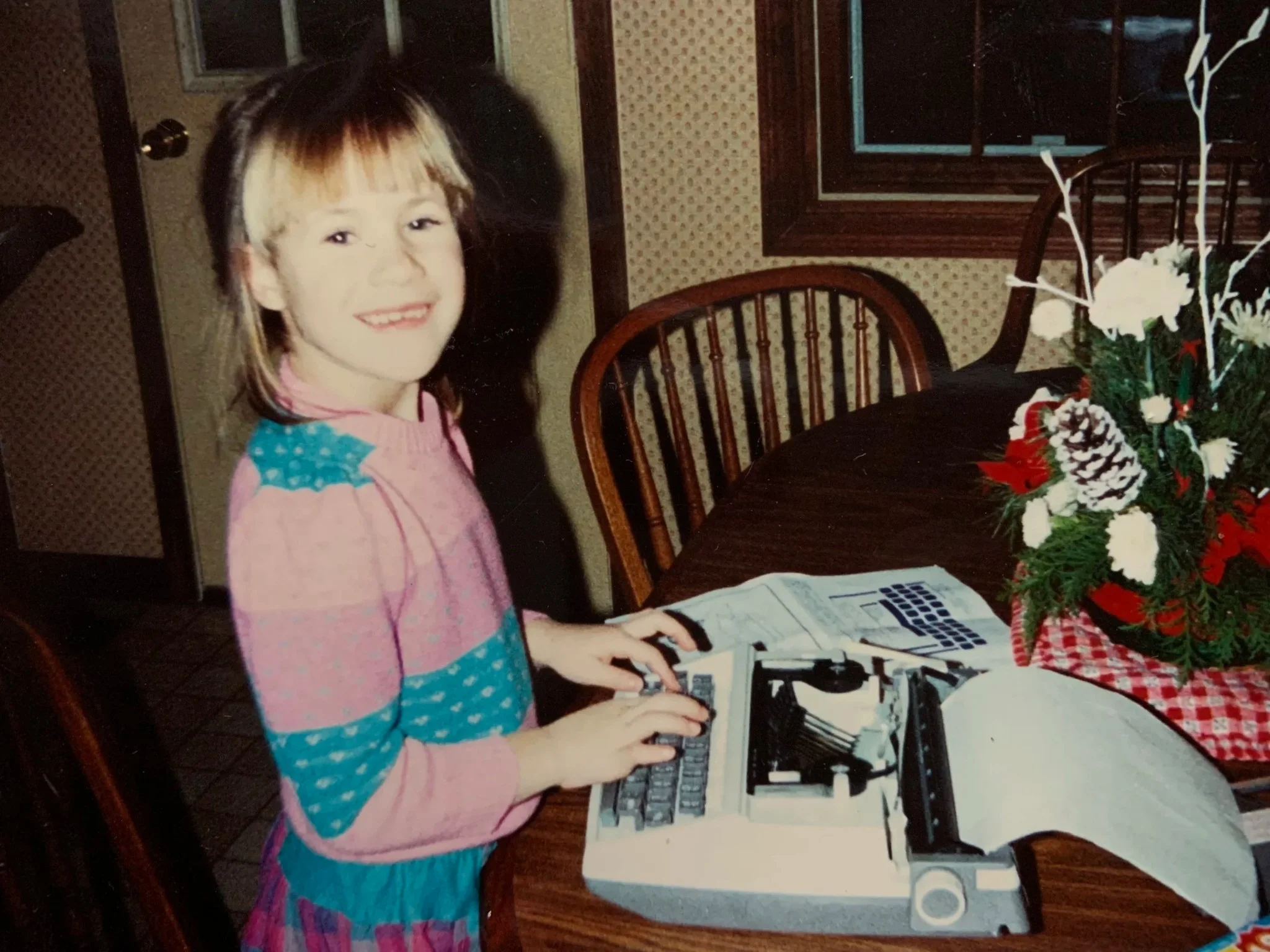 Young Elizabeth at a typewriter